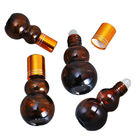 Flaschen Kalebasse-Amber Glass Odm Roll On-ätherischen Öls mit Edelstahl-Massage-Ball